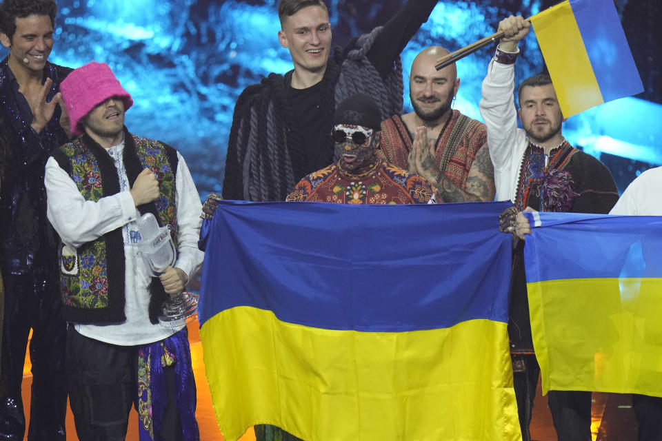 Kalush Orchestra from Ukraine celebrates after winning the Grand Final of the Eurovision Song Contest at Palaolimpico arena, in Turin, Italy, Saturday, May 14, 2022. (AP Photo/Luca Bruno)