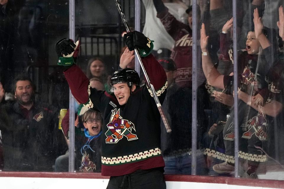 Arizona Coyotes right wing Josh Doan (91) celebrates after scoring his first NHL goal in the second period against the Columbus Blue Jackets at Mullett Arena in Tempe on March 26, 2024.