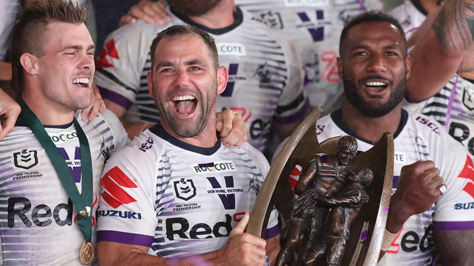 Cam Smith is pictured here celebrating the Storm's 2020 grand final victory.