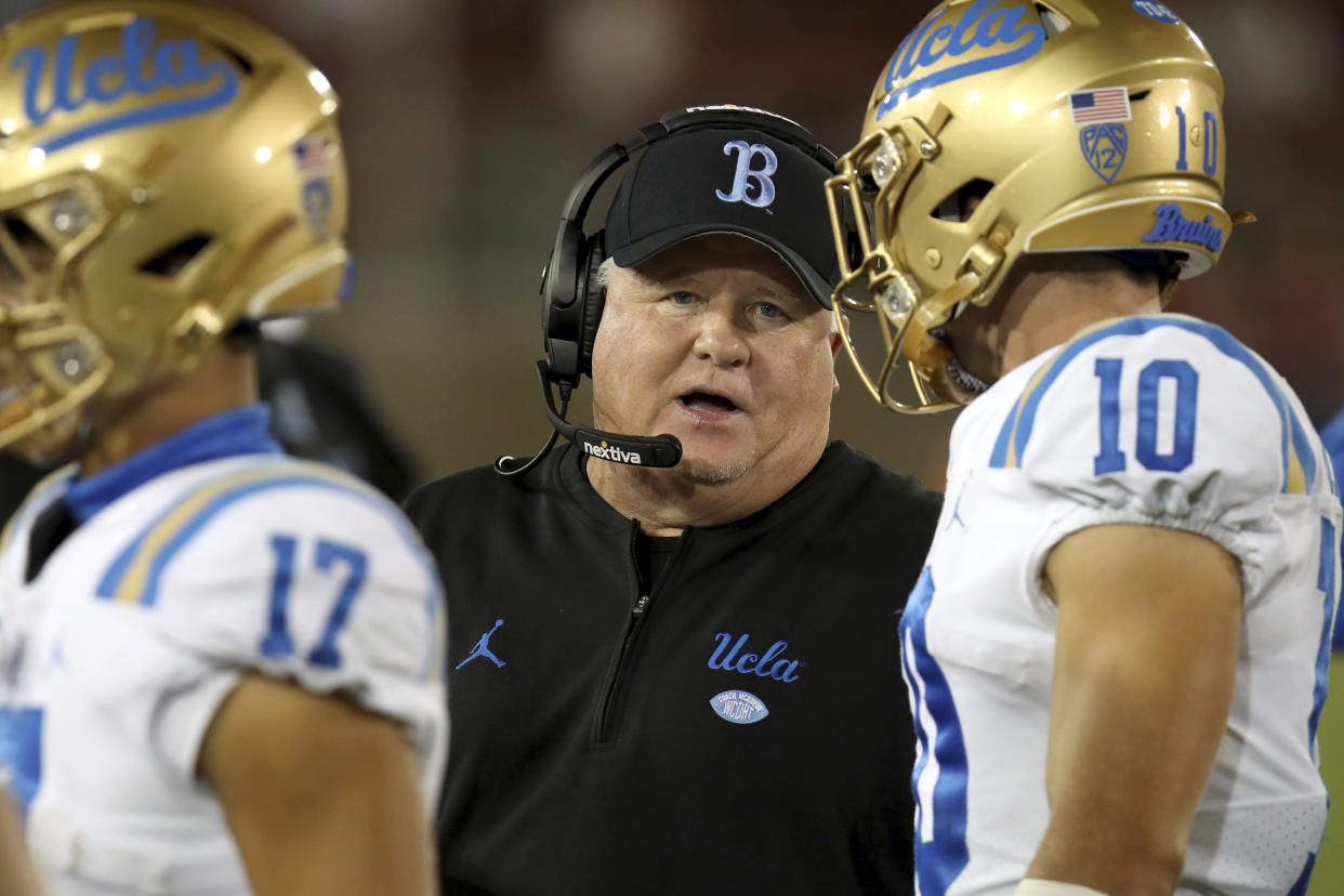 FILE - UCLA head coach Chip Kelly stands on the sideline during an NCAA college football game against Stanford, Saturday, Oct. 21, 2023, in Stanford, Calif. Chip Kelly has informed UCLA officials that he is stepping down as coach of the Bruins, a person with direct knowledge of the decision told The Associated Press on Friday, Feb. 9, 2024.(AP Photo/Scot Tucker, File)