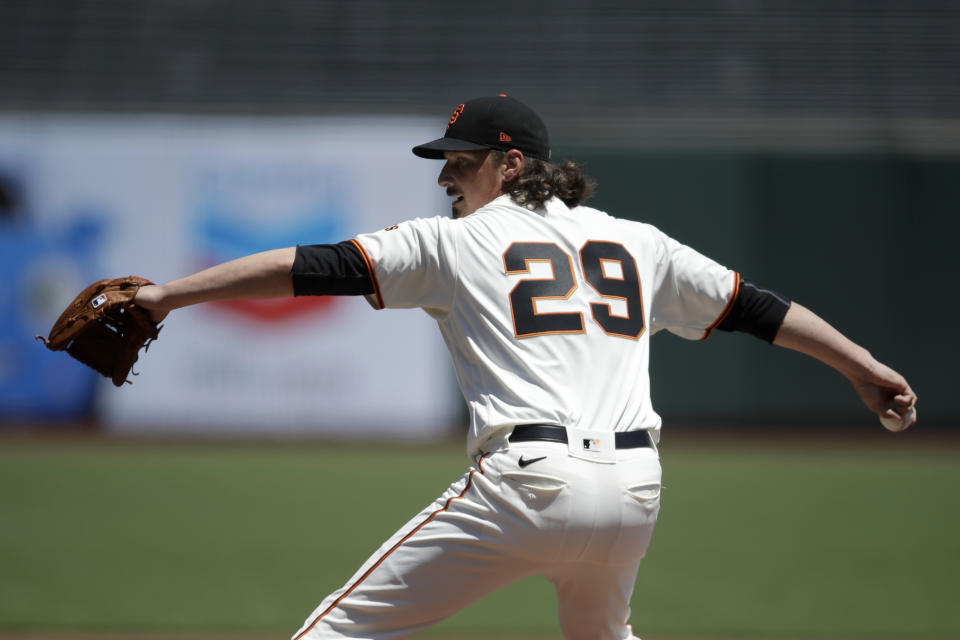 San Francisco Giants pitcher Jeff Samardzija works against the Texas Rangers in the first inning of a baseball game Sunday, Aug. 2, 2020, in San Francisco. (AP Photo/Ben Margot)