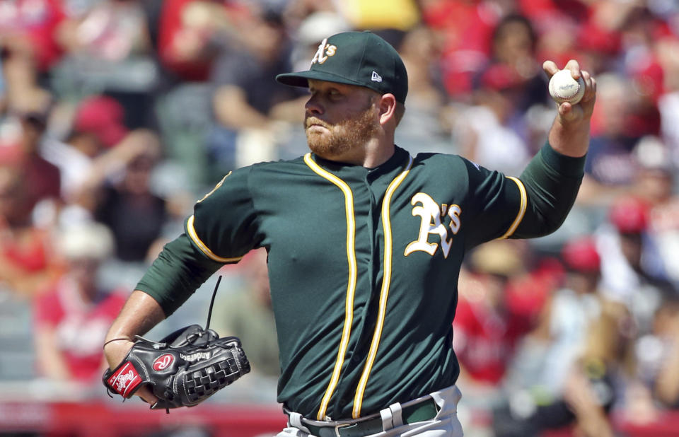 Oakland Athletics starter Brett Anderson pitches to the Los Angeles Angels in the first inning of a baseball game in Anaheim, Calif., Sunday, Sept. 30, 2018. (AP Photo/Reed Saxon)