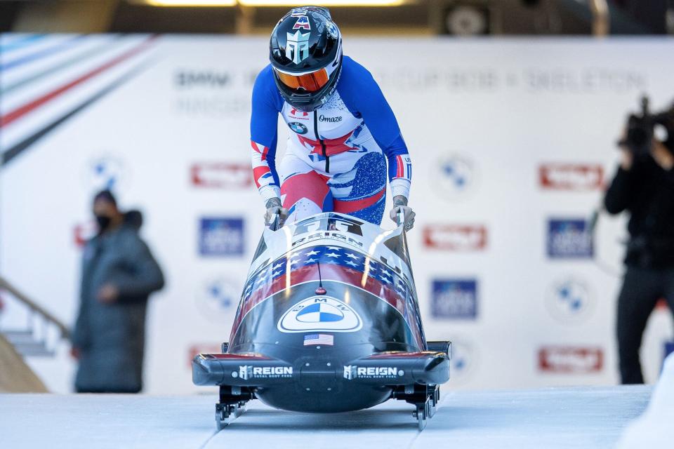 Kaillie Humphries of the US starts for the first run of the women's monobob competition during the IBSF Bob and Skeleton World Cup, the opening event of the Olympic season, at the Olympic sliding track in Innsbruck, Austria, on November 20, 2021. - - Austria OUT (Photo by Peter RINDERER / various sources / AFP) / Austria OUT (Photo by PETER RINDERER/EXPA/AFP via Getty Images)