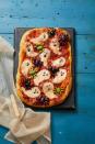 <p>Normally bugs on your food is a turn off — but not when they're made of olives. And if olives aren't your thing, you can still enjoy a cheesy, ghostly pizza.</p><p>Get the recipe from <a href="https://www.womansday.com/food-recipes/a33564112/ghostly-pizza-recipe/" rel="nofollow noopener" target="_blank" data-ylk="slk:Woman's Day;elm:context_link;itc:0;sec:content-canvas" class="link ">Woman's Day</a>.</p>