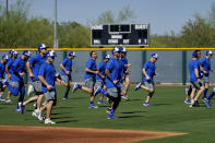 Israel Olympic baseball players work out at Salt River Fields spring training facility, Wednesday, May 12, 2021, in Scottsdale, Ariz. Israel has qualified for the six-team baseball tournament at the Tokyo Olympic games which will be its first appearance at the Olympics in any team sport since 1976. (AP Photo/Matt York)