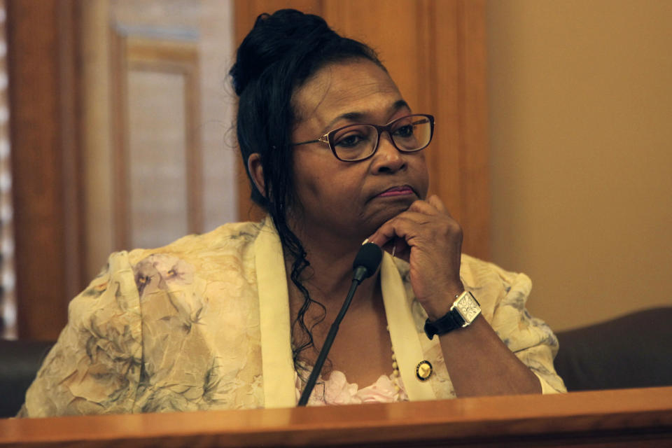 Kansas state Sen. Oletha Faust-Goudeau, D-Wichita, follows negotiations between the House and the Senate over a bill that would stop giving voters an extra three days to return their mail ballots, Monday, April 1, 2024, at the Statehouse in Topeka, Kan. Faust-Goudeau says there's no reason to end the "grace period." (AP Photo/John Hanna)