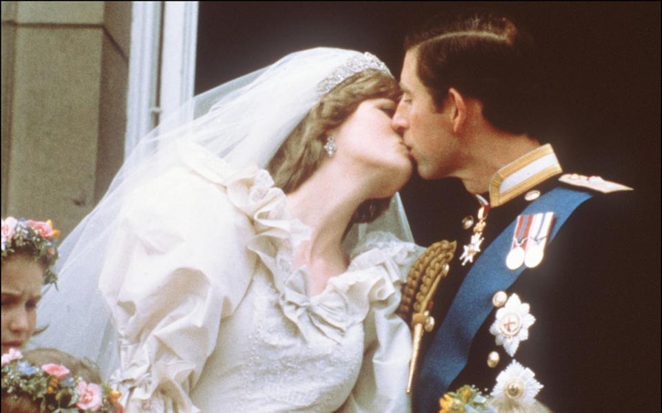 The Prince of Wales and Diana, Princess of Wales, on their wedding day - AFP