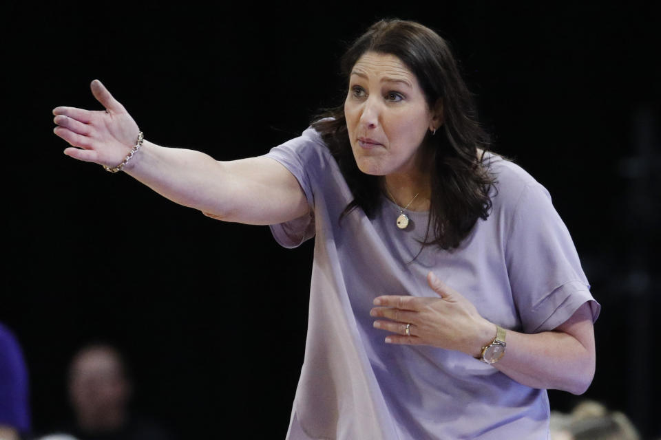 Washington head coach Jody Wynn motions to her players during the second half of an NCAA college basketball game against Utah in the first round of the Pac-12 women's tournament Thursday, March 5, 2020, in Las Vegas. (AP Photo/John Locher)