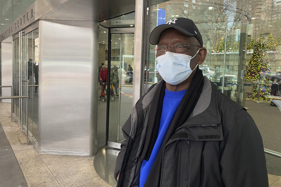 Taikwan Wright waits outside while his nephew is treated for asthma in the ICU in Bellevue Hospital in New York on Wednesday, Jan. 3, 2023. The previous week, New York City resumed a mask mandate for the city’s 11 public hospitals. (AP Photo/Mary Conlon)