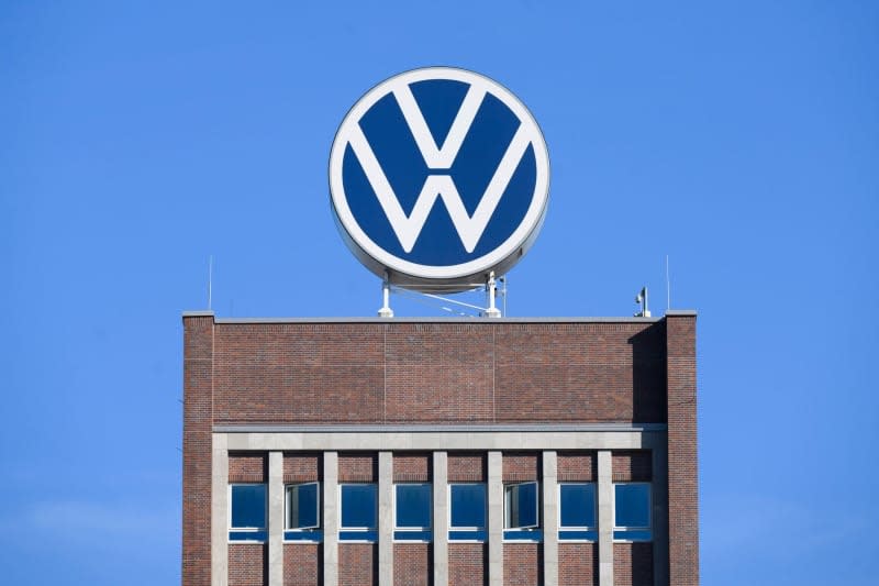 German carmaker Volkswagen (VW) logo stands on the brand tower at the VW's main plant. Volkswagen is examining a reorganization of its activities in the Chinese region of Xinjiang in light of possible human rights violations. Julian Stratenschulte/dpa