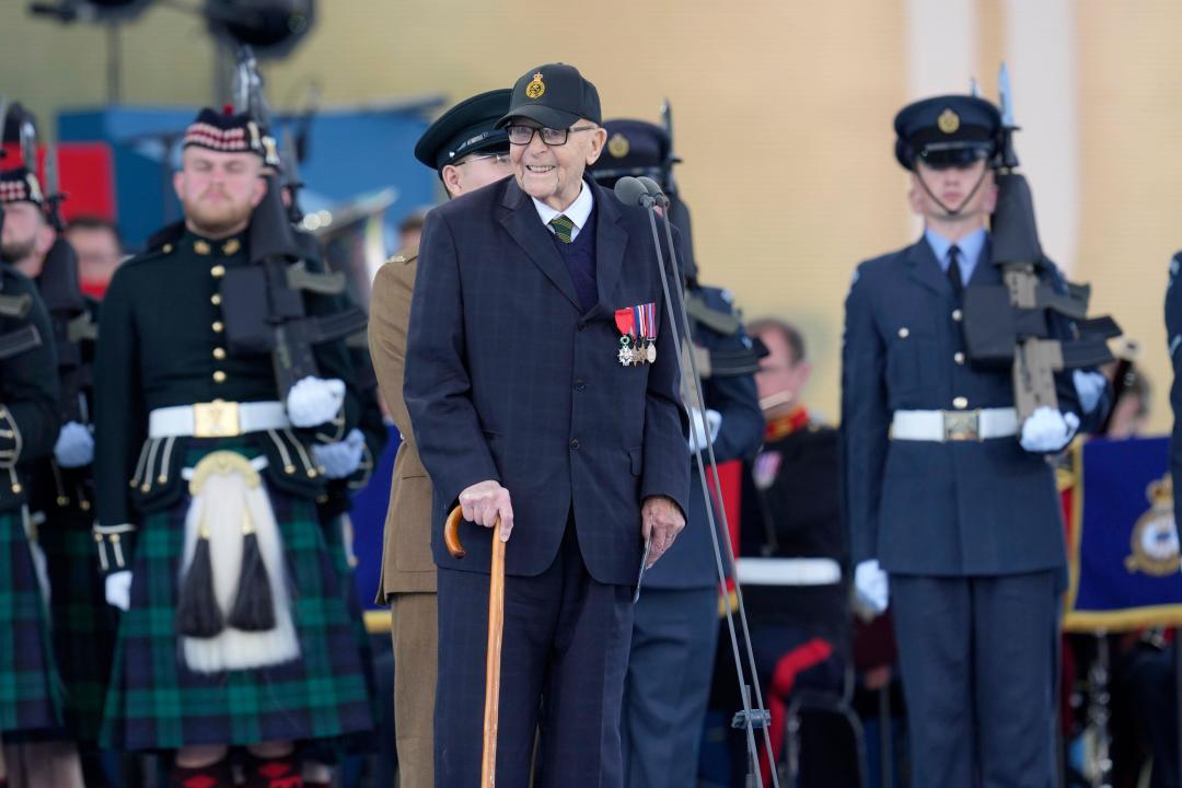 Normandy Veteran Roy Hayward speaks on the stage during a D-Day national commemoration event in Portsmouth, England, Wednesday, June 5, 2024.(AP Photo/Kin Cheung, Pool)