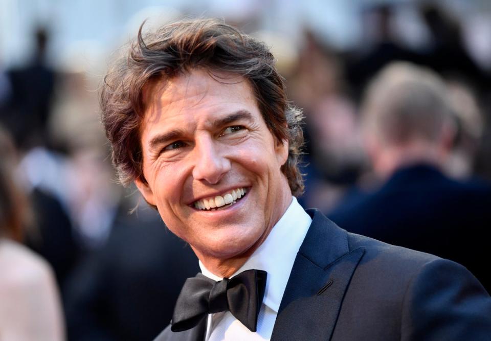 Tom Cruise is halting expensive production work on Mission: Impossible to attend King Charles’  Coronation  (Gareth Cattermole/Getty Images f)