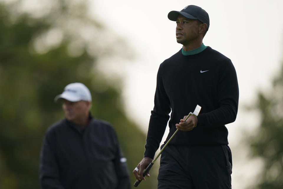 Tiger Woods walks the 11th green during practice before the U.S. Open Championship golf tournament at Winged Foot Golf Club, Tuesday, Sept. 15, 2020, in Mamaroneck, N.Y. (AP Photo/John Minchillo)