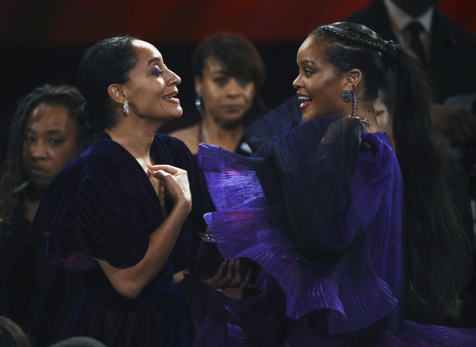 Tracee Ellis Ross, left, talks with Rihanna at the 51st NAACP Image Awards at the Pasadena Civic Auditorium on Saturday, Feb. 22, 2020, in Pasadena, Calif. (AP Photo/Chris Pizzello)