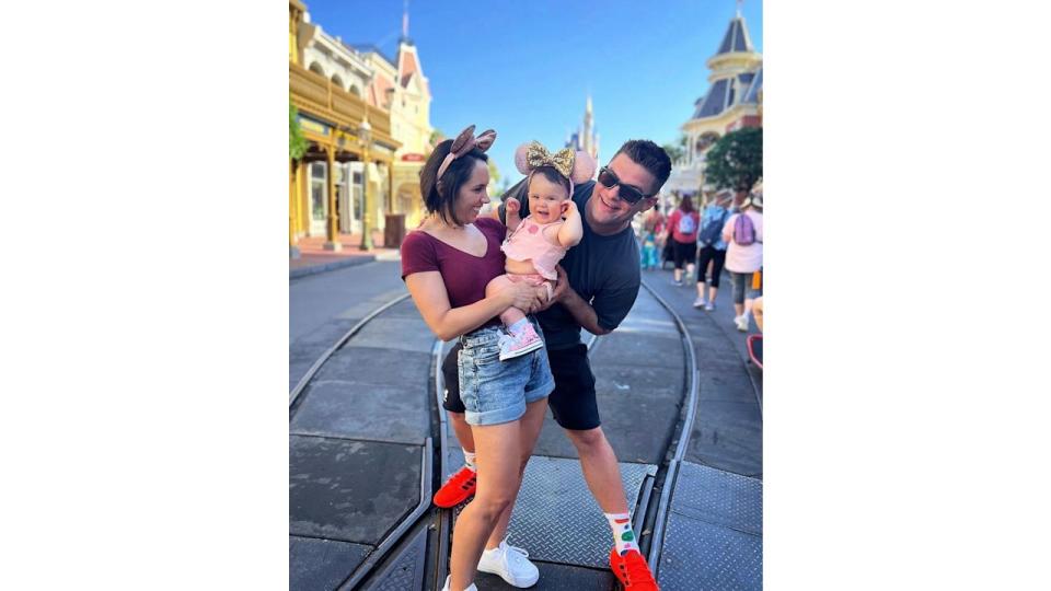 Janette Manrara, Aljaz Skorjanec and Lyra smile for photo at Disneyland