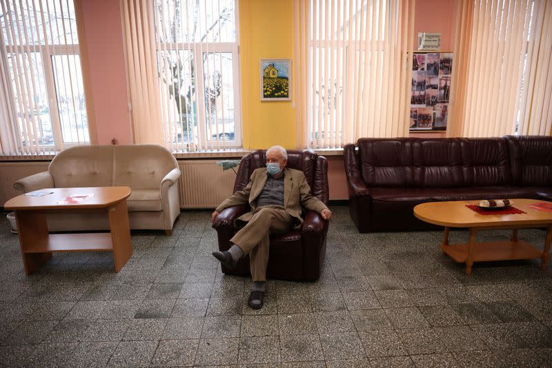 Man awaits to receive coronavirus disease (COVID-19) vaccine at a care home in Sofia