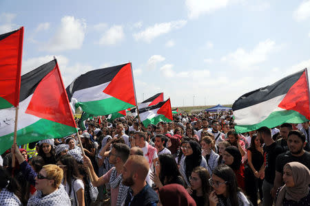 Israeli Arabs take part in a rally calling for the right of return for refugees who fled their homes during the 1948 Arab-Israeli War, near Atlit, Israel April 19, 2018. REUTERS/Ammar Awad