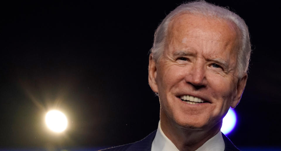 Joe Biden smiles as he is declared the 46th president.