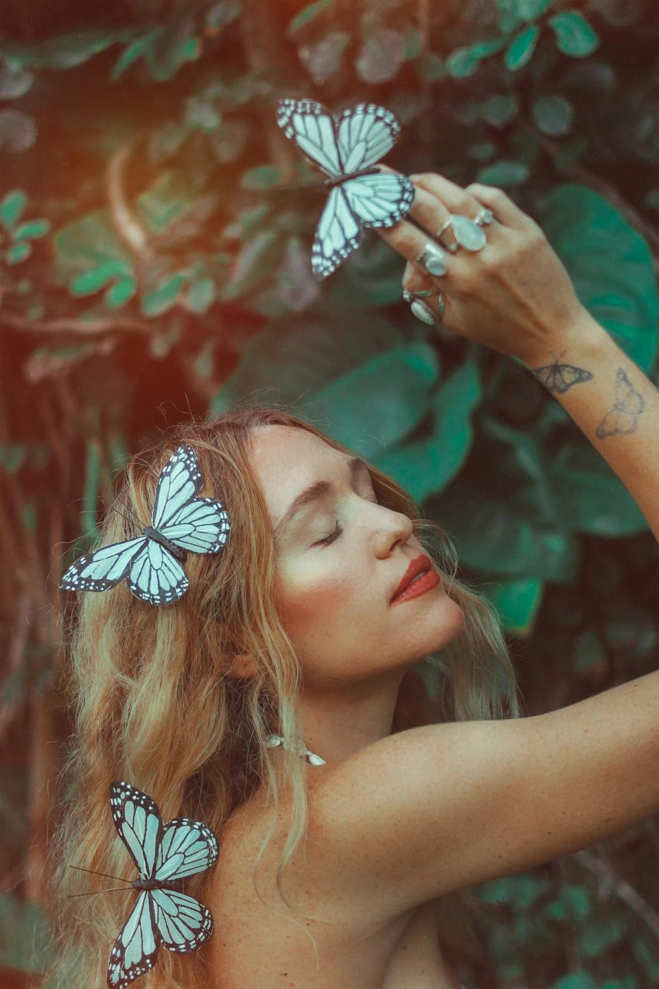 Photo: wildandfreejewelry. Sky Monarch Butterfly Hair Clips. Etsy.