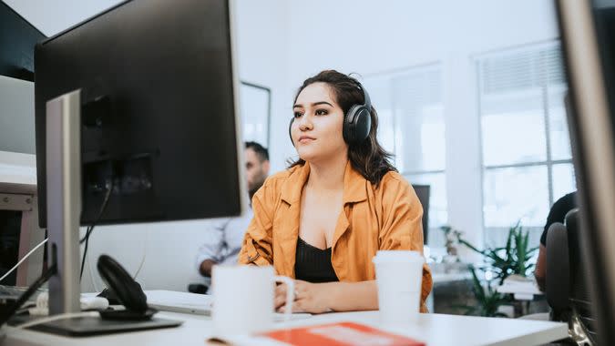 A young Hispanic / Latin entrepreneur at her place of work.