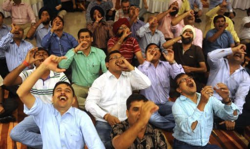 Indian participants take part in a session of 'laughter club' on the outskirts of New Delhi in August 2012. India's "guru of giggling" Madan Kataria, has made thousands of people laugh around the world in pursuit of better health. "Laughter Yoga" is a movement that has attracted fans worldwide including celebrities Oprah Winfrey and Goldie Hawn