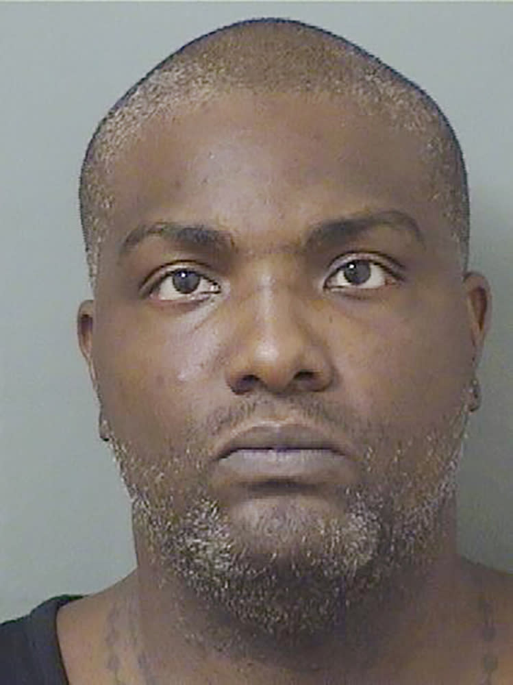 FILE - This Sept. 16, 2019 photo made available by the Palm Beach County Sheriff's Office shows Robert Hayes under arrest. A jury has found Hayes, a former Bethune-Cookman University cheerleader, guilty in the deaths of three Florida prostitutes more than 15 years ago, on Tuesday, Feb. 22, 2022. Prosecutors will seek the death penalty during a penalty phase next week. (Palm Beach County Sheriff's Office via AP, File)