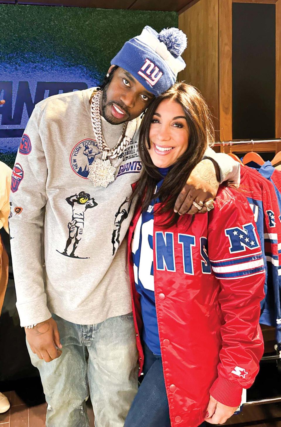 Angela Thomas with her client, hip hop artist Fivio Foreign at Met Life Stadium