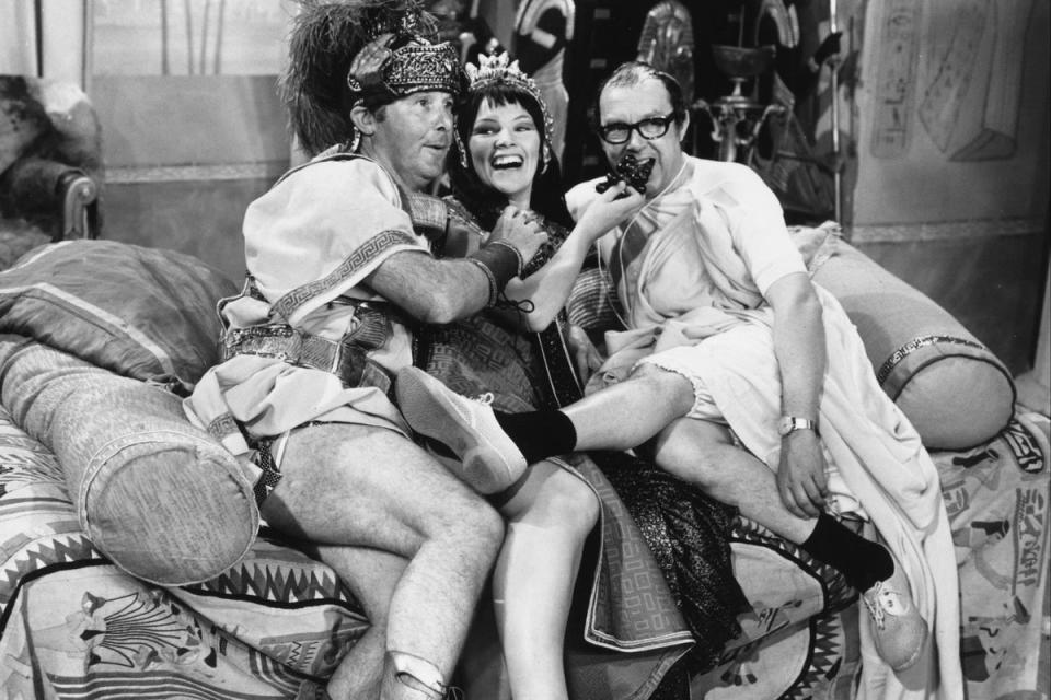 Glenda Jackson dressed as Cleopatra, with British comedians Eric Morecambe (right) and Ernie Wise (Getty Images)