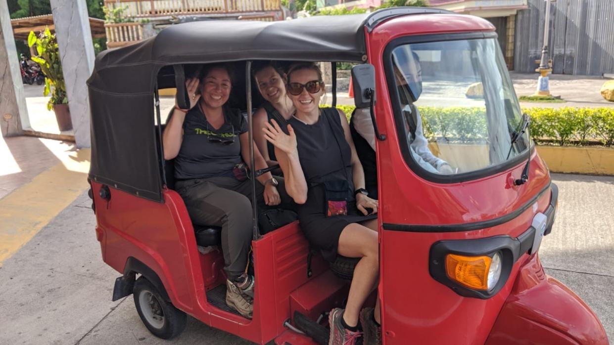 Shawn Taylor, front, rides with students in Guachi, Honduras.