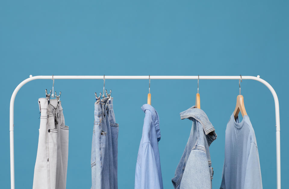 You might ask, "How do you store extra clothes?" The truth is you'll want to keep a few pieces around even when the weather changes. (Photo: AnnaStills via Getty Images)