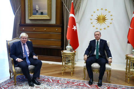 Turkish President Tayyip Erdogan (R) meets with British Foreign Secretary Boris Johnson at the Presidential Palace in Ankara, Turkey, September 27, 2016. Kayhan Ozer/Presidential Palace/Handout via REUTERS
