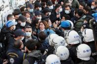 People attend a demonstration in Istanbul