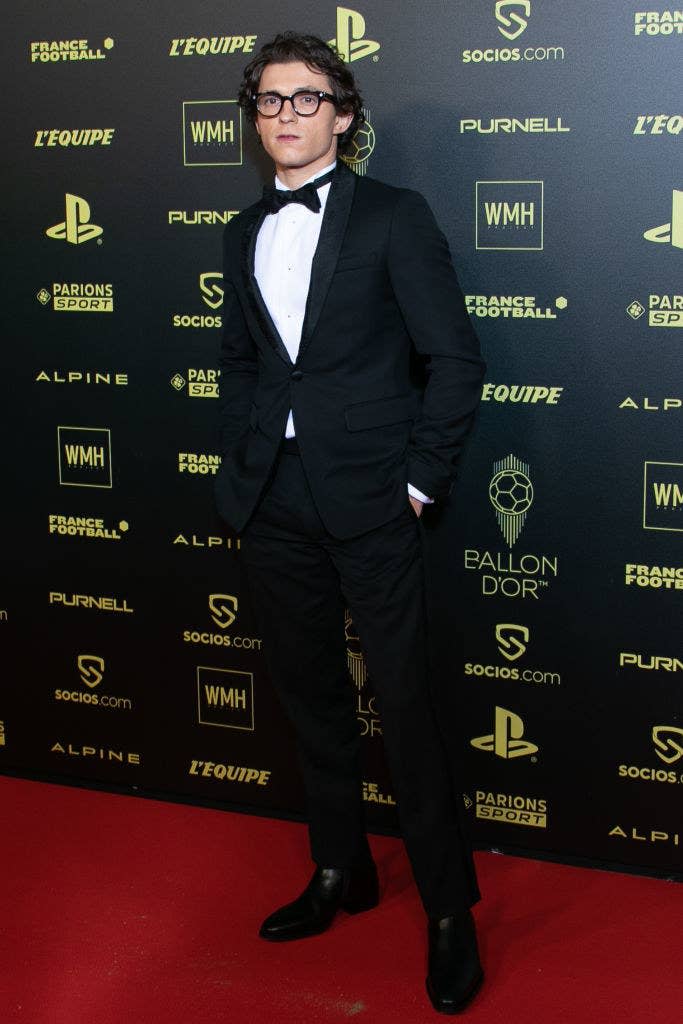 Tom rocks a tuxedo at the the Ballon D'Or red carpet