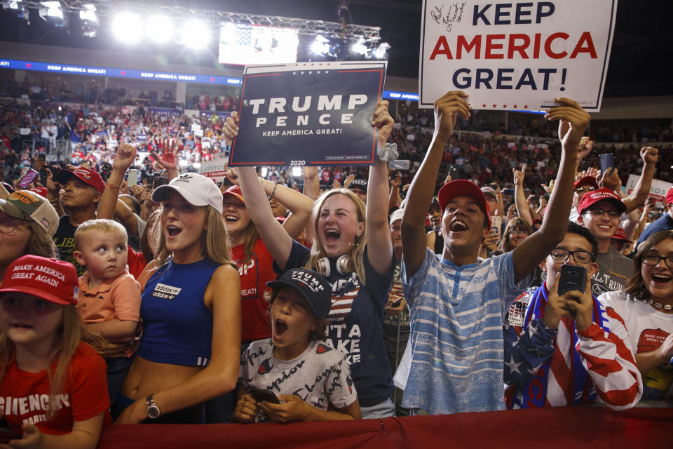 Supporters of President Donald Trump cheer as he arrives to speak at a campaign rally at the Santa Ana Star Center, Monday, Sept. 16, 2019, in Rio Rancho, N.M. (AP Photo/Evan Vucci)