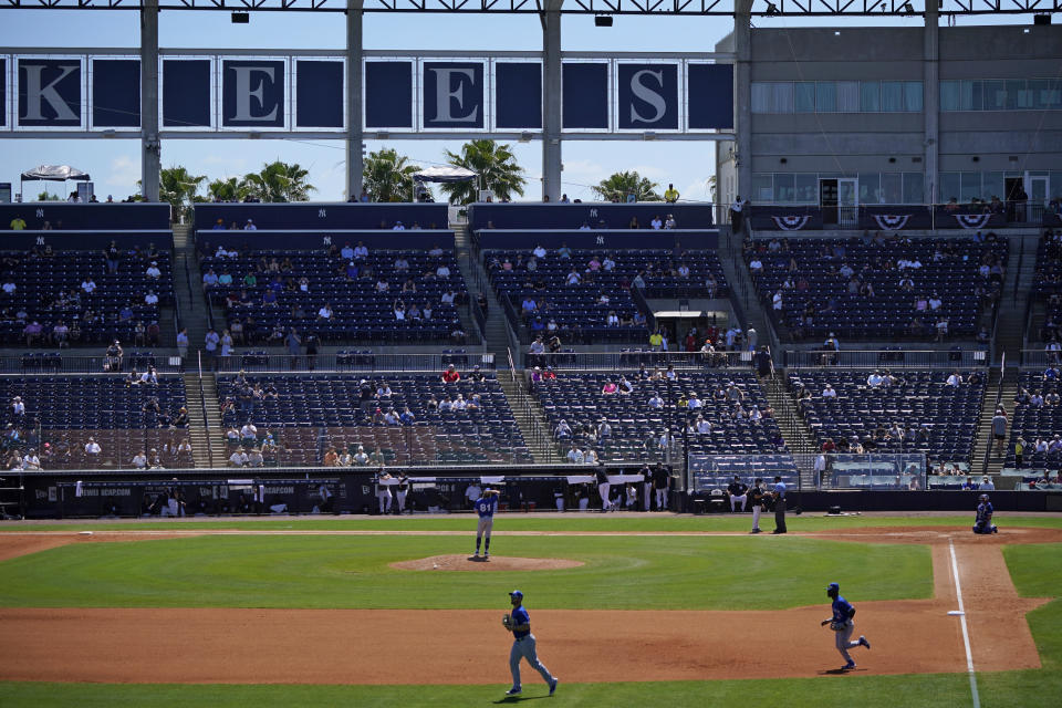 The Toronto Blue Jays take the field during a spring training exhibition baseball game, with a limited number of fans, socially distanced in attendance, against the New York Yankees at George M. Steinbrenner Field in Tampa, Fla., Saturday, March 27, 2021. (AP Photo/Gene J. Puskar)