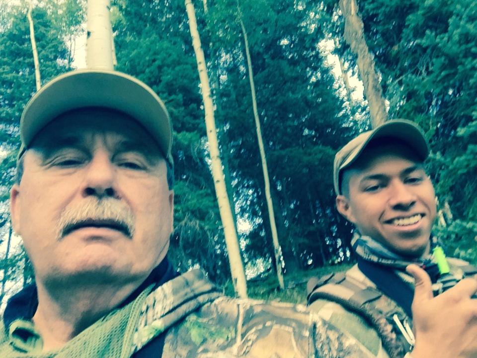 Ahh, happier times for American-Statesman outdoors writer Mike Leggett, left, as he was hunting elk in the mountains of New Mexico with Sloan Baca. Leggett recently suffered injuries, including a broken nose and a concussion, while trying to hold onto his Great Pyrenees dog.