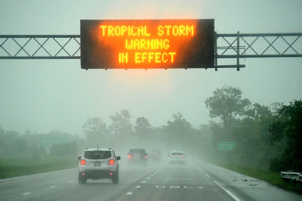 Tropical storm warning signs are up along U.S. 74/76 as Tropical Storm Debby continues to move up the southeastern coast Wednesday, Aug. 7, 2024.