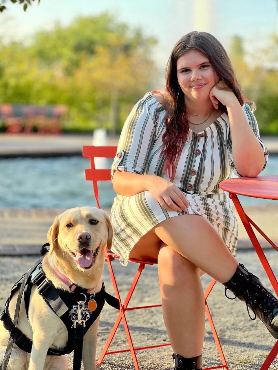 Carmen Bahr, a graduating Southeast Polk High School senior, with Jaylee, the service dog she trained for IOWA Service Dogs. After graduating from two years of service dog training in October 2023, Jaylee now provides a veteran with the support he needs to go out in public.