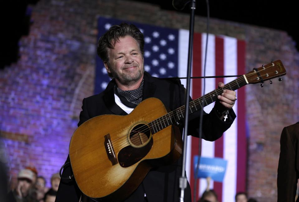 FILE - This Nov. 5, 2012 file photo shows John Mellencamp performing during a campaign rally at the American Civil War Center at the Historic Tredegar Ironworks, in Richmond, Va. More and more singer-songwriters from the rock and pop world are turning to the stage. Mellencamp, Sarah McLachlan, Tori Amos, Edie Brickell, David Byrne, Fatboy Slim, Burt Bacharach, Elvis Costello and The Flaming Lips are making musicals. (AP Photo/Matt Rourke, file)