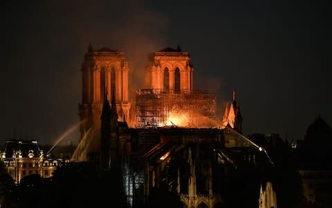 Britain stands ready to help efforts to rebuild Notre-Dame - Credit: BERTRAND GUAY/AFP