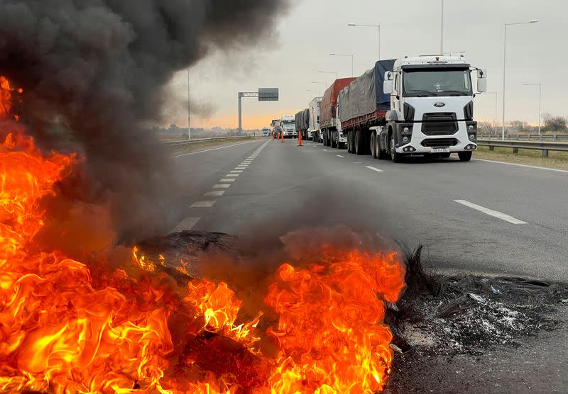 FILE PHOTO: Argentine truck drivers block roads to protest against the shortages and rising prices for diesel fuel, in San Nicolas