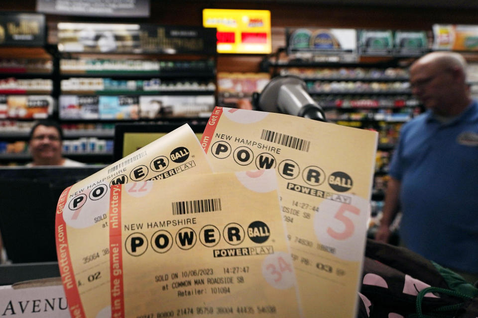 Powerball lottery tickets are displayed at the New Hampshire General Store along Route 93 South, Friday, Oct. 6, 2023, in Hooksett, N.H. The upcoming $1.4 billion Powerball jackpot is the world's fifth-largest lottery prize due to higher interest rates, long odds, fewer ticket sales per drawing, and luck. (AP Photo/Charles Krupa)