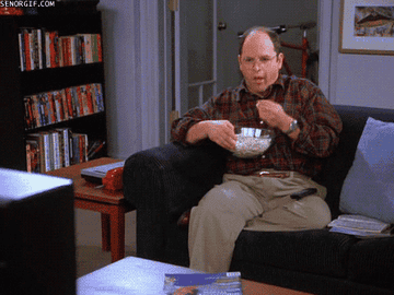 george costanza eating popcorn and watching tv