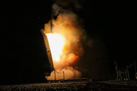 The U.S. Navy guided-missile cruiser USS Monterey fires a Tomahawk land attack missile April 14, 2018. U.S. Navy/Lt. j.g Matthew Daniels/Handout via REUTERS.