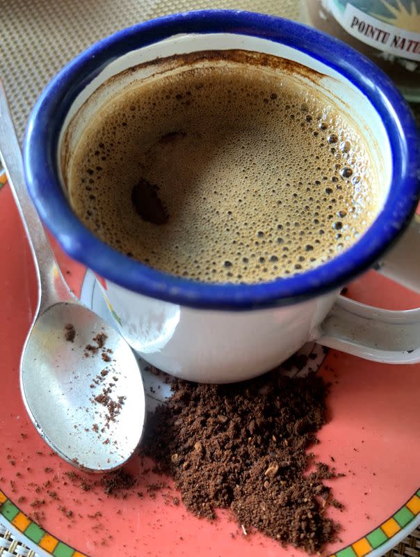 A mixed cup of coffee sample is seen at the Kafen Drazana packaging of the Bourbon pointu coffee variety in Ampefy town of Itasy region