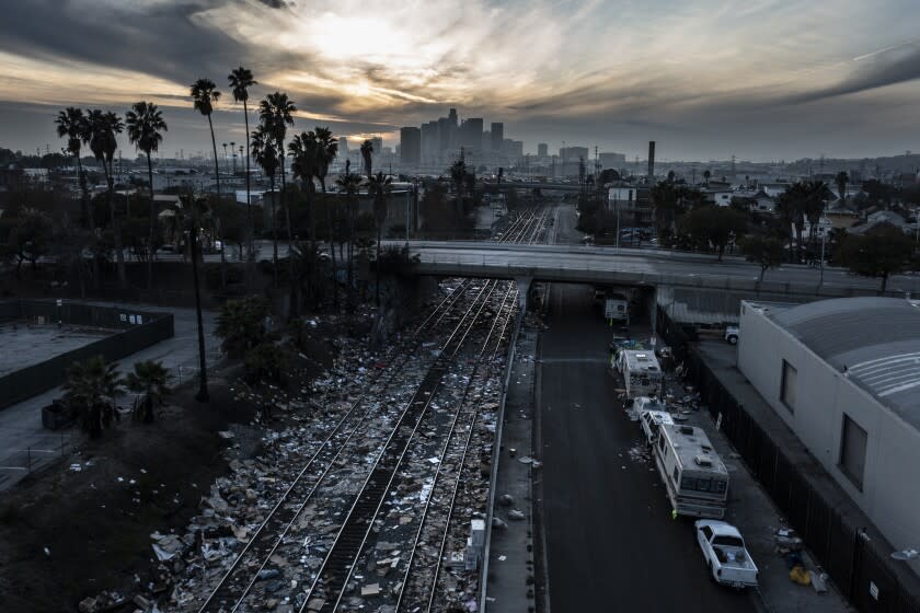 Los Angeles, CA, Friday, January 14, 2022 - Debris is strewn across railroad tracks passing through Lincoln Heights. It is reportedly from looted boxcars. (Robert Gauthier/Los Angeles Times)