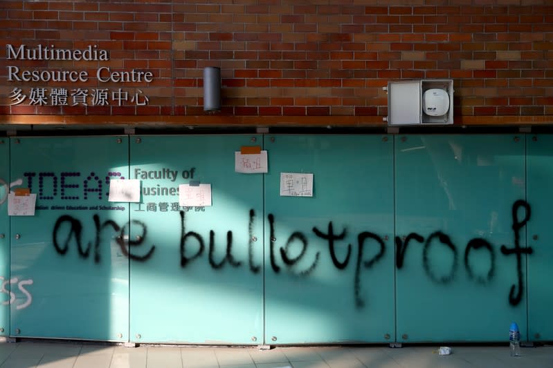 A message is written in graffiti on the campus of the Hong Kong Polytechnic University (PolyU) in Hong Kong