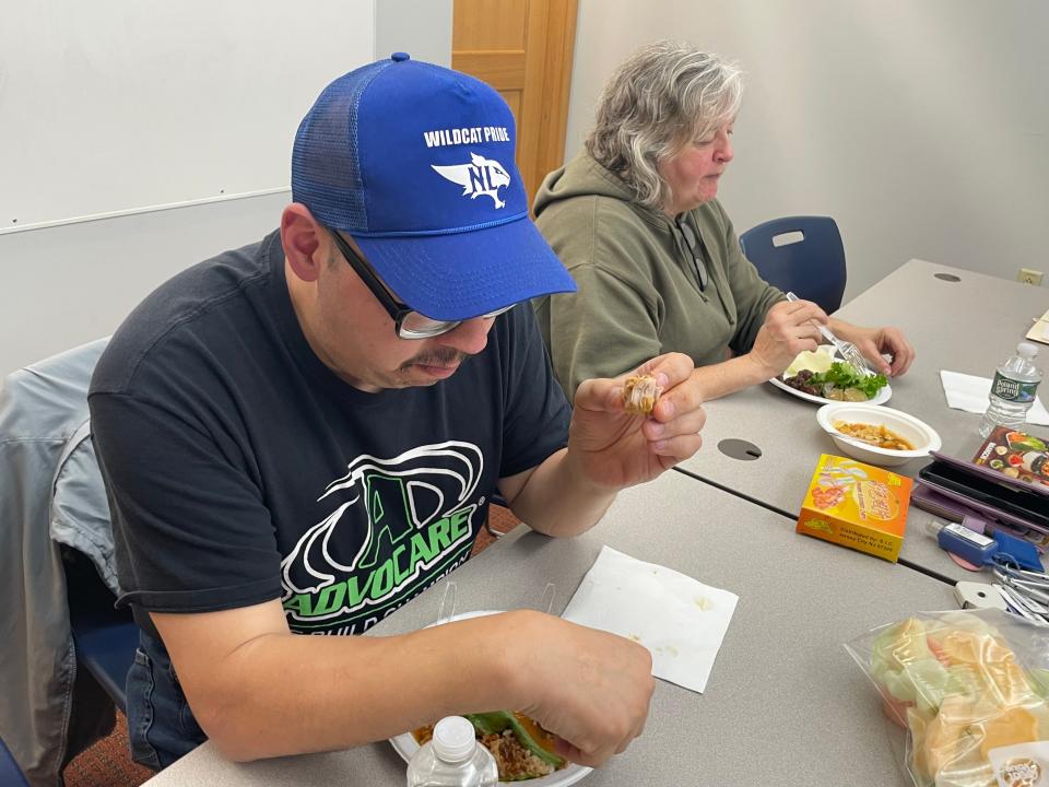 Norwich residents Nathan Genia and Karen Carignan at Otis Library's Cultural Cooking Club Wednesday. Since they cook frequently anyway, the club was a natural fit. They've attended all three meetings so far.