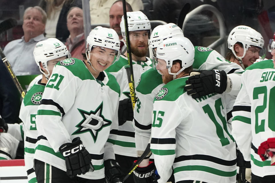 Dallas Stars center Joe Pavelski (16) celebrates his goal against the Detroit Red Wings with teammates in the second period of an NHL hockey game Monday, April 10, 2023, in Detroit. (AP Photo/Paul Sancya)