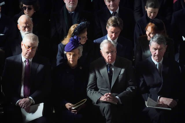 <p>Jonathan Brady - WPA Pool/Getty</p> Prince Andrew, Birgitte, Duchess of Gloucester, Prince Richard, Duke of Gloucester, and Vice Admiral Sir Timothy Laurence, sit in a row ahead of Prince Michael of Kent, Princess Beatrice, Edoardo Mapelli Mozzi and Sarah Ferguson at the Thanksgiving Service for King Constantine on February 27.